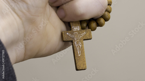 my last rescue - hand with wooden rosary