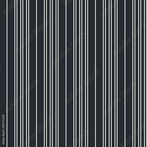 Seamless vector vertical modern stripe pattern in white with a black background. Repeat monochrome design element for prints, wrap, textile, fabric, decor.