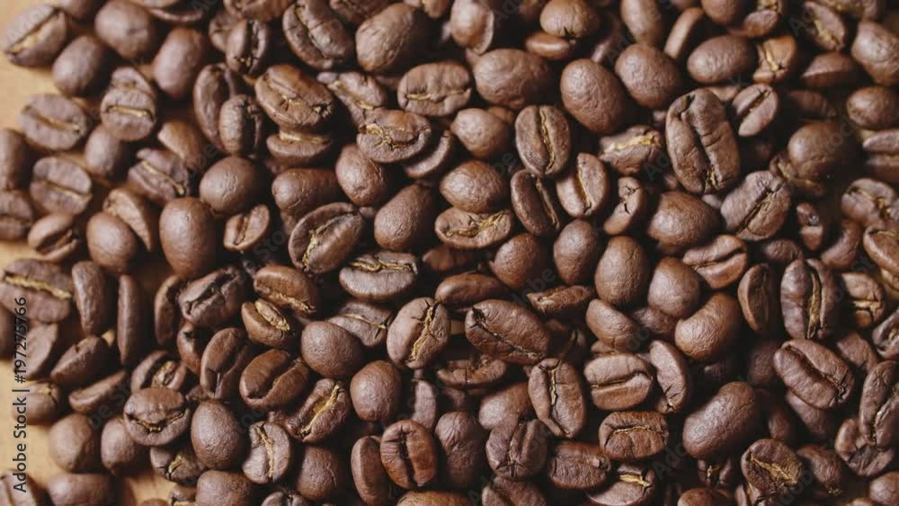 Overhead Rotating Shot Of Aromatic And Roasted Coffee Beans Overhead Rotating Shot Of Aromatic And Roasted Coffee Beans