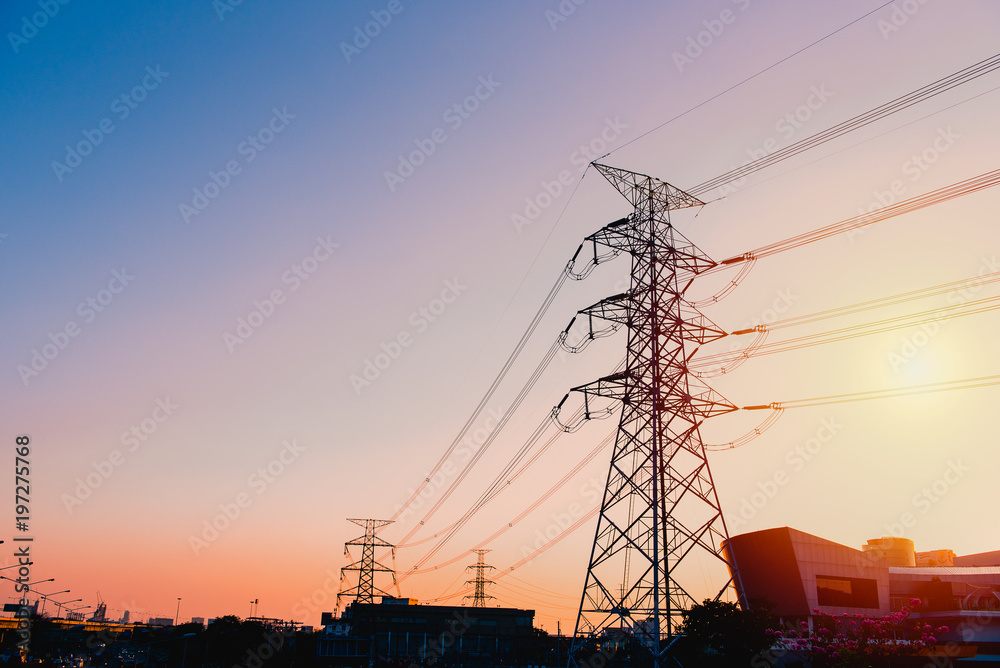 Silhouette high voltage post or High voltage tower with twilight