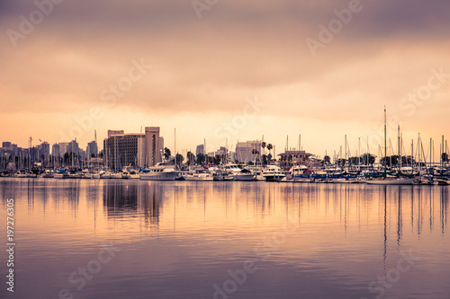 View of beautiful San Diego California with boats, sunset and buildings. © littleny