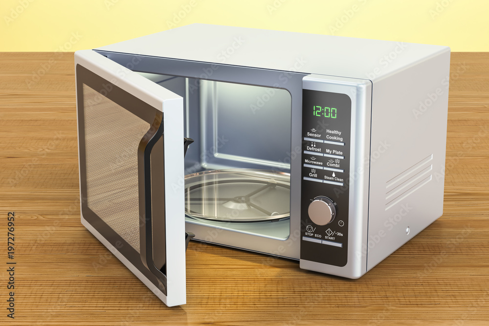 Fototapeta premium Microwave on the wooden table. 3D rendering