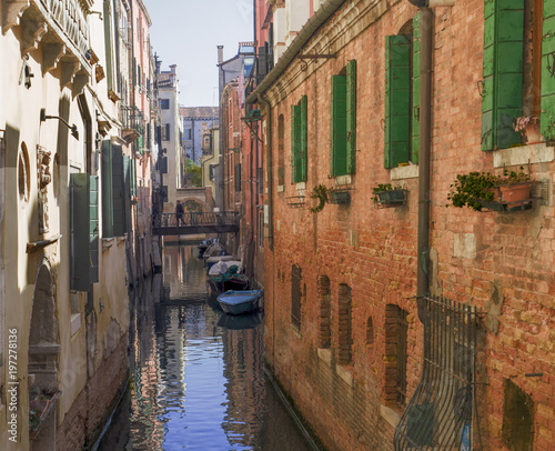 view on a colorful, narrow and gorgeous canal of Venice,Italy