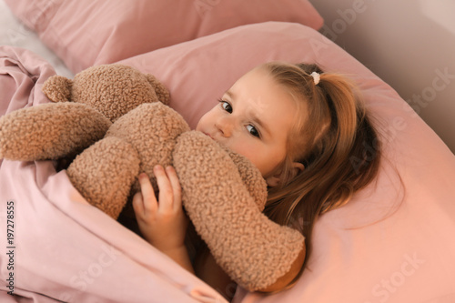 Cute little girl with teddy...