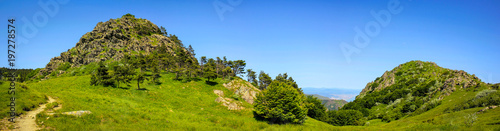 Alpine landscape panorama and city of Genova in the background in Beigua National Geopark, Liguria, Italy
