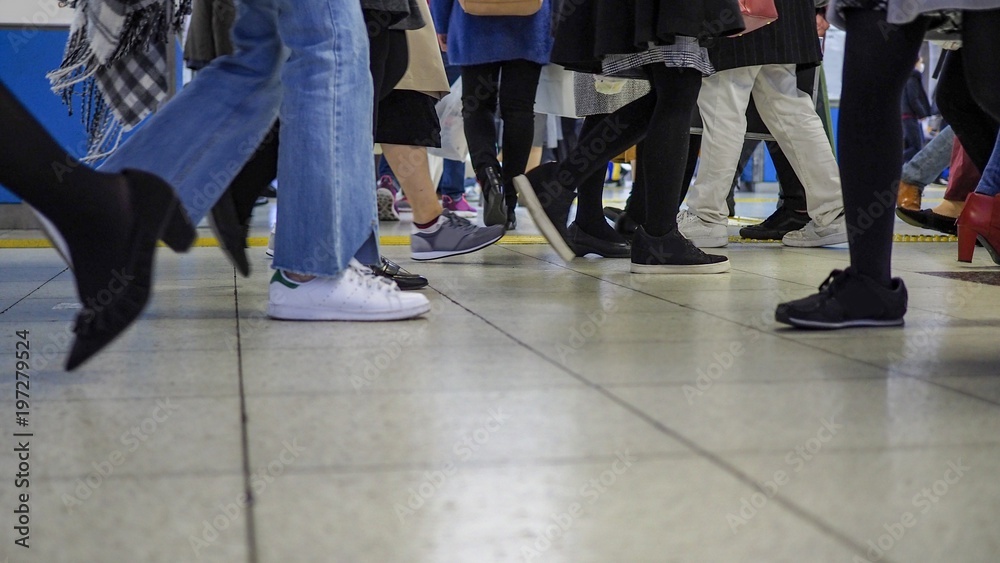 People feet’s walking at busy subway station. People feet’s walking at busy subway station.