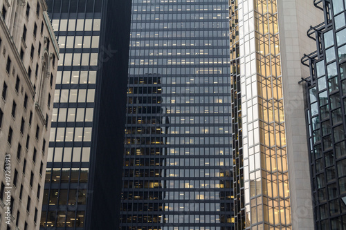Photography Skyscrapers reflecting in the mirror like windows of another modern high rise in