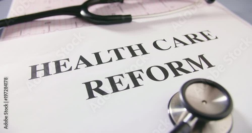 Stethoscope And Health Care Reform With ECG Report