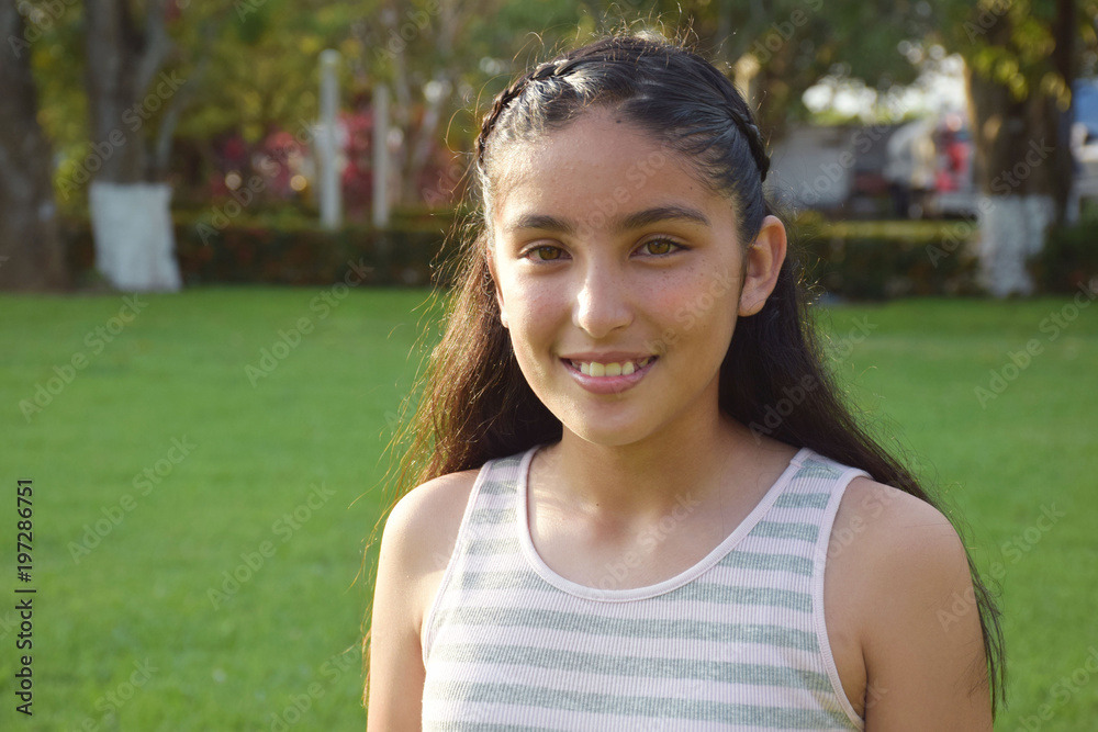 portrait of beautiful smiling girl in the park portrait of beautiful smiling girl in the park