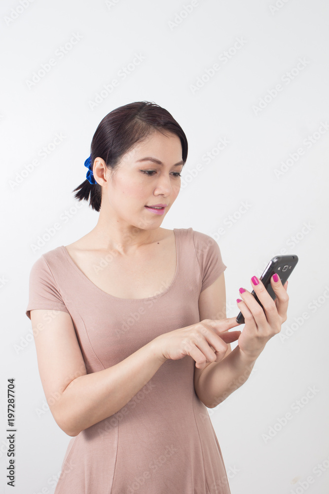 Asia Businesswoman touching screen smartphone Asia Businesswoman touching screen smartphone