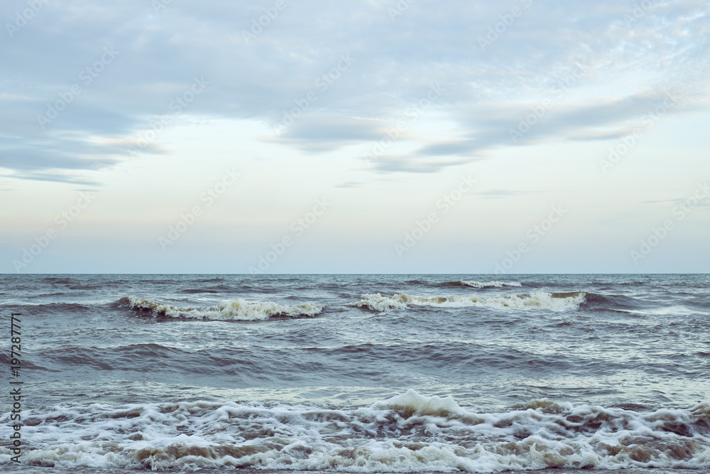 Fototapeta premium Beautiful clear water lapping on the shore