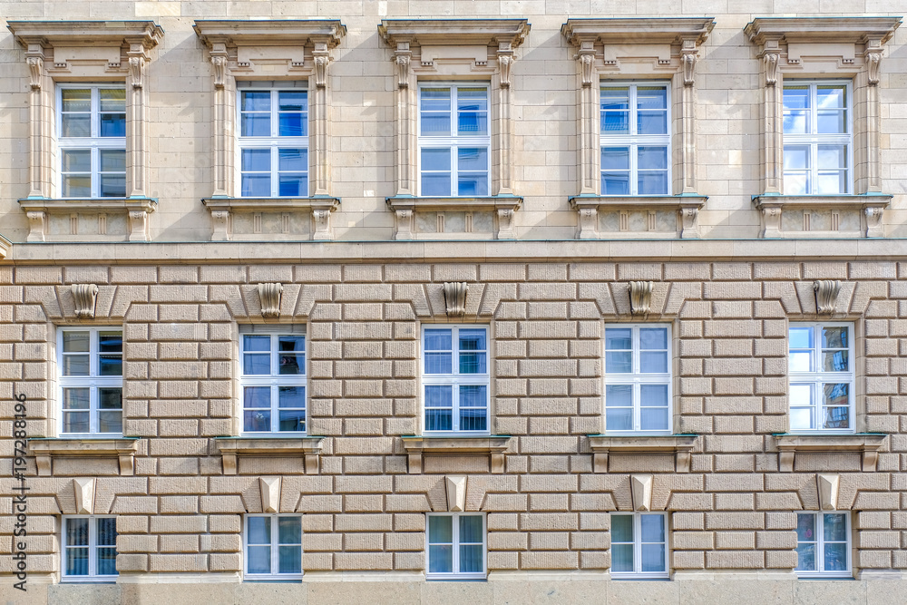 Vintage building facade windows pattern in Berlin Germany