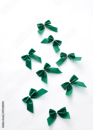 Green velvet bows on white