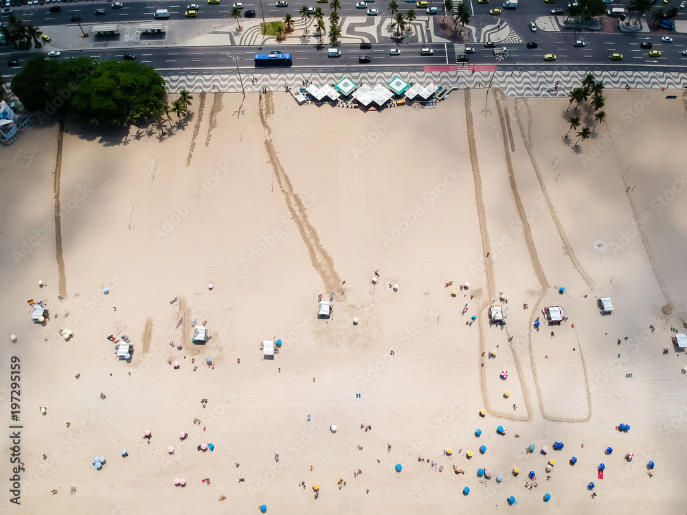 Aerial view of Copacabana beach during summer, sun with clouds