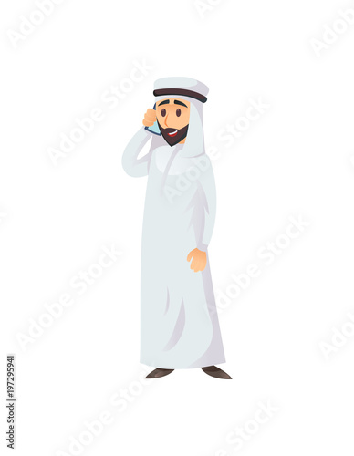 Adult Arabian businessman in traditional clothes talking on smartphone on white background.