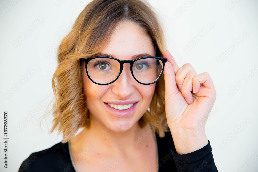 young woman in glasses
