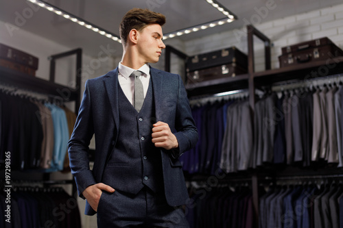 Perfect to the last detail. Modern businessman. Fashion shot of a handsome young man in elegant classic suit. Men's beauty, fashion.