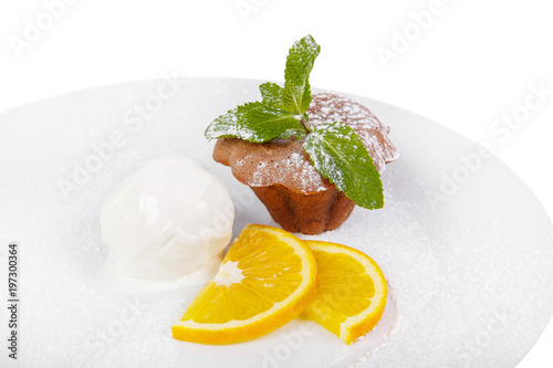 chocolate cake with orange and ice cream isolated photo