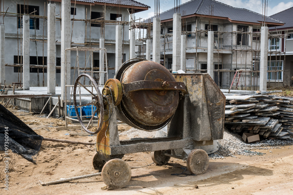 cement concrete mixer machine at new house building construction site cement concrete mixer machine at new house building construction site