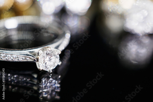 Jewelry diamond rings with reflection on black background