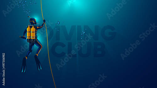 One scuba diver underwater. Back view. Diver look on big logo diving club underwater. Diver dives to the bottom of the sea, holding the rope, The sun's rays underwater. Scuba diving background. photo