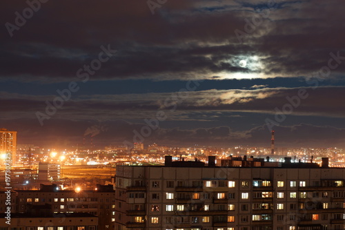 Panorama of a night city from a window, a beautiful sky