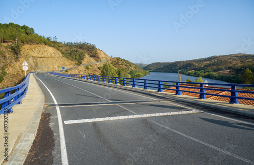 Lower Guadiana International Bridge over Chanca river at the Portuguese-Spanish border. photo