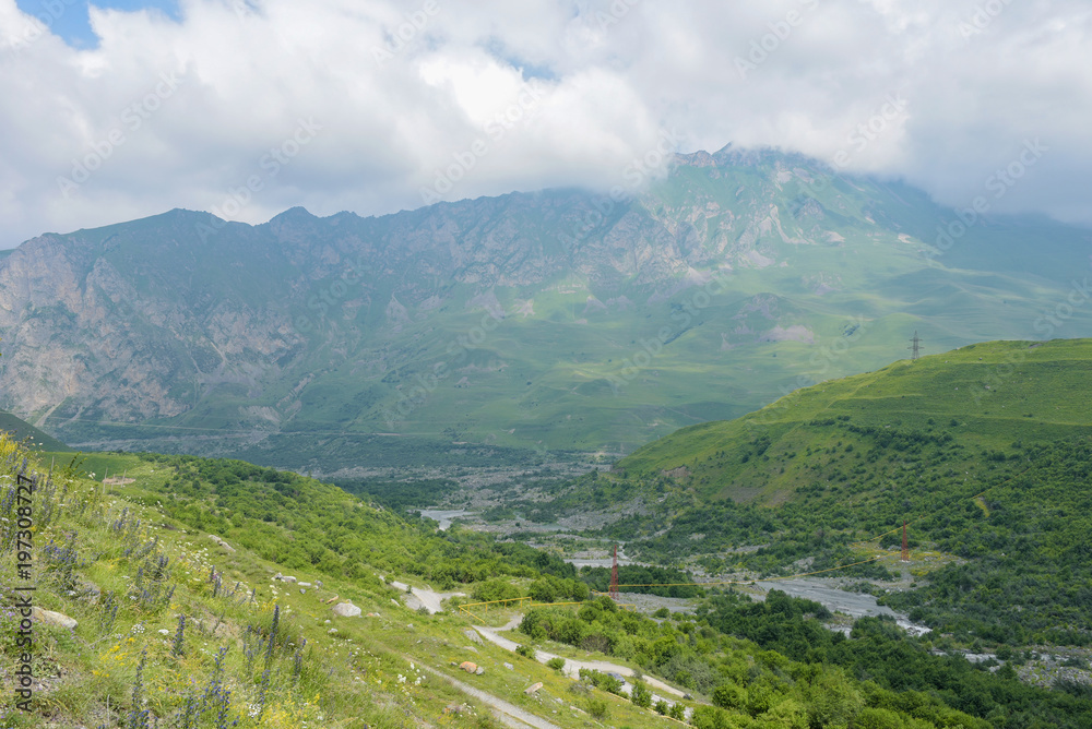 The Karmadon (Genaldon) Gorge summer view. North Ossetia, Russia. The Caucasus Mountains.