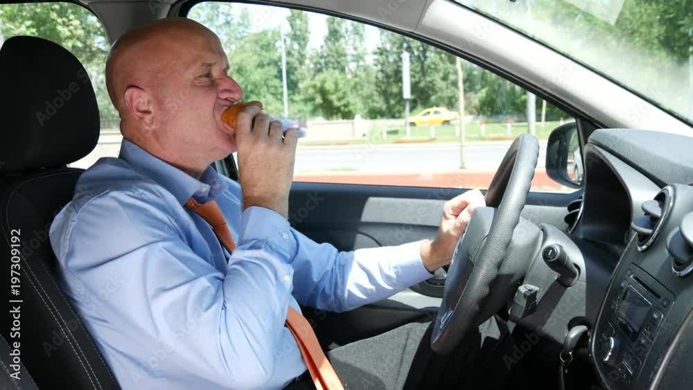 Hungry Taxi Cab Driver Looking Starved Stop the Car and Eat a Tasty Snack Hungry Taxi Cab Driver Looking Starved Stop the Car and Eat a Tasty Snack