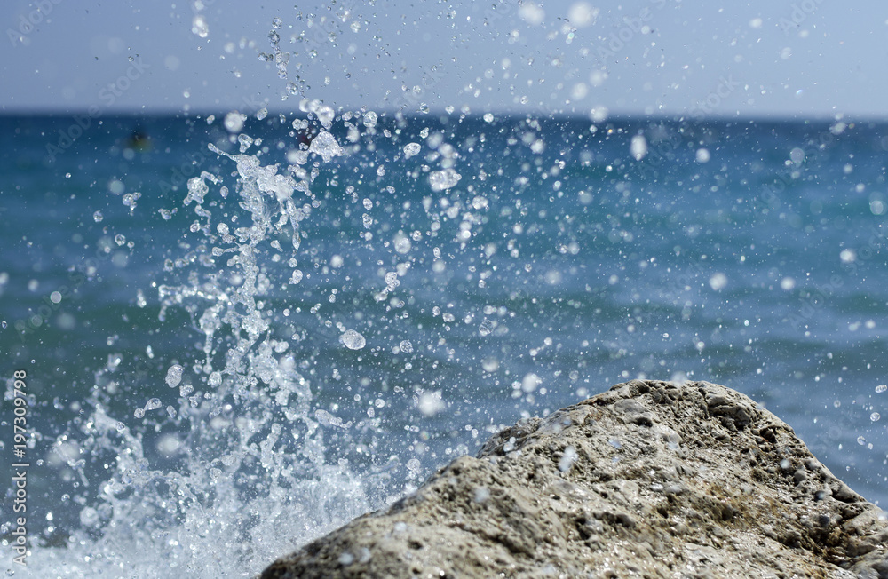 Obraz premium Sea glowing splashes on the Mediterranean sea in the summer season