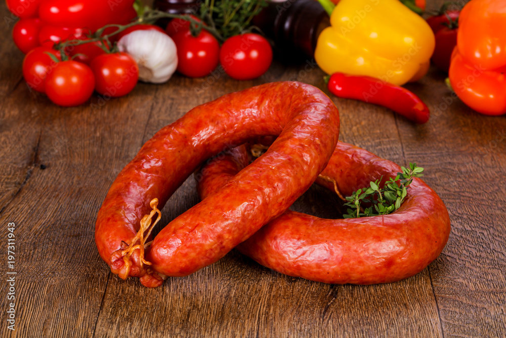 Pork sausages over wooden