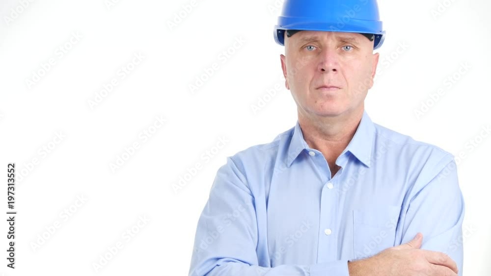 Serious Engineer Wearing Helmet Make Welcome or Goodbye Hand Sign Serious Engineer Wearing Helmet Make Welcome or Goodbye Hand Sign