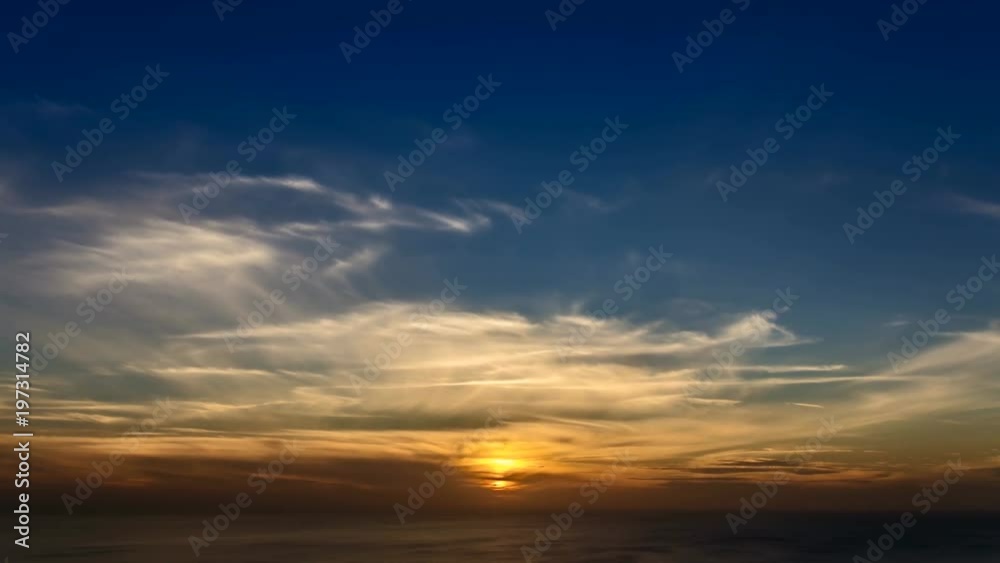 4k time lapse of clouds crossing the amazing sky over the sea or ocean at sunset. transition from day to night. The clouds cross slowly from left to right colored yellow orange purple blue. 4k time lapse of clouds crossing the amazing sky over the sea or ocean at sunset. transition from day to night. The clouds cross slowly from left to right colored yellow orange purple blue.