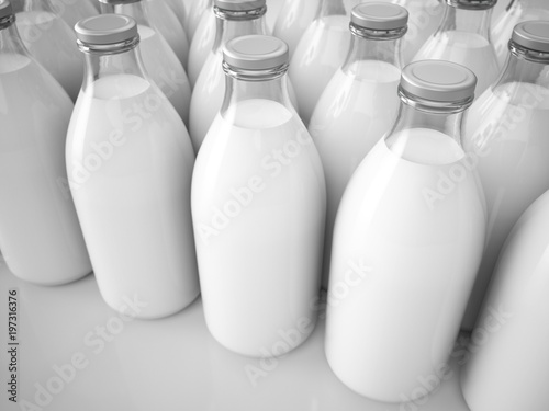3D rendering row of glass milk bottles