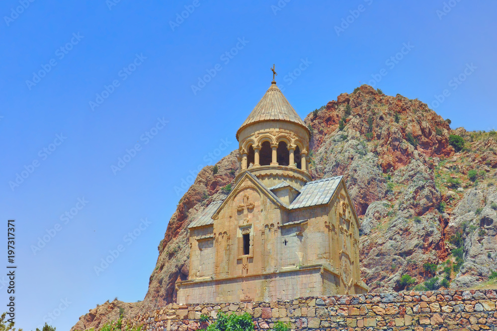 Monastery Noravank built of natural stone tuff. Landscaped view of the stone mountains. The city of Yeghegnadzor, Armenia.