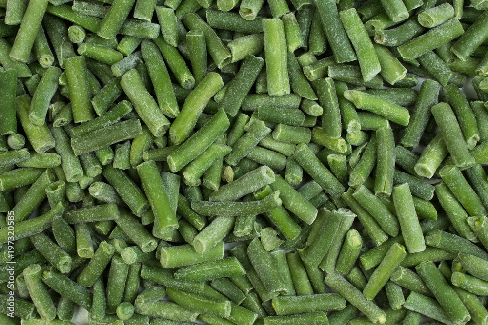 frozen chopped asparagus beans. top view. background green wax beans. frozen chopped asparagus beans. top view. background green wax beans.