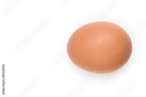 Single brown chicken egg isolated on white. Top view