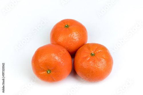 Ripe orange fresh mandarin isolated on white background.