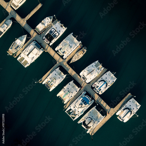 Aerial view of berthed boats at marina