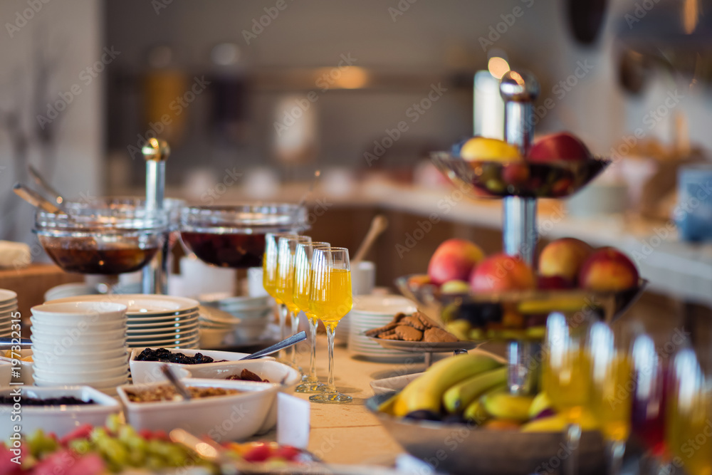 Fresh and bright continental breakfast table with jam. Table settings