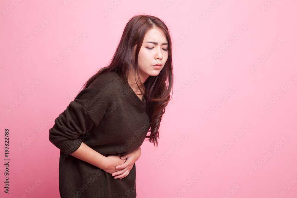 Young Asian woman got stomachache. Young Asian woman got stomachache.