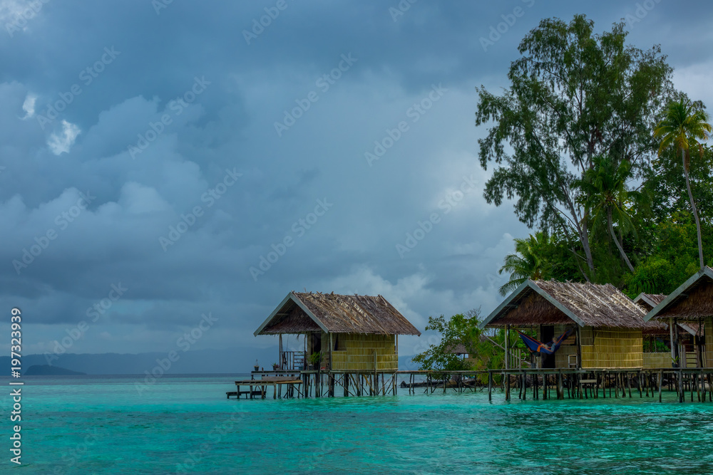 Cloudy Evening and Huts on the Water