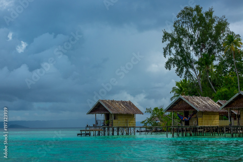 Cloudy Evening and Huts on the Water