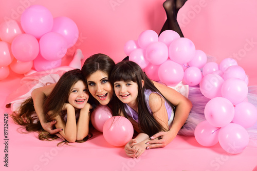 Mother and kid with pink balloons vintage