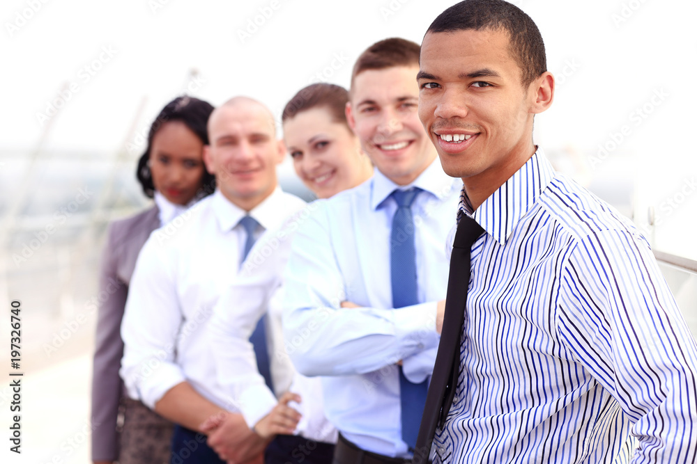Group of business people with businessman leader on foreground Group of business people with businessman leader on foreground