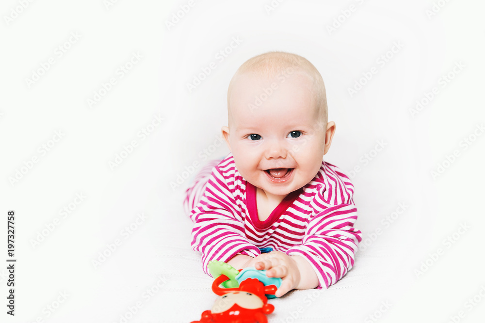 Smiling cutest baby playing with colorful toys Smiling cutest baby playing with colorful toys