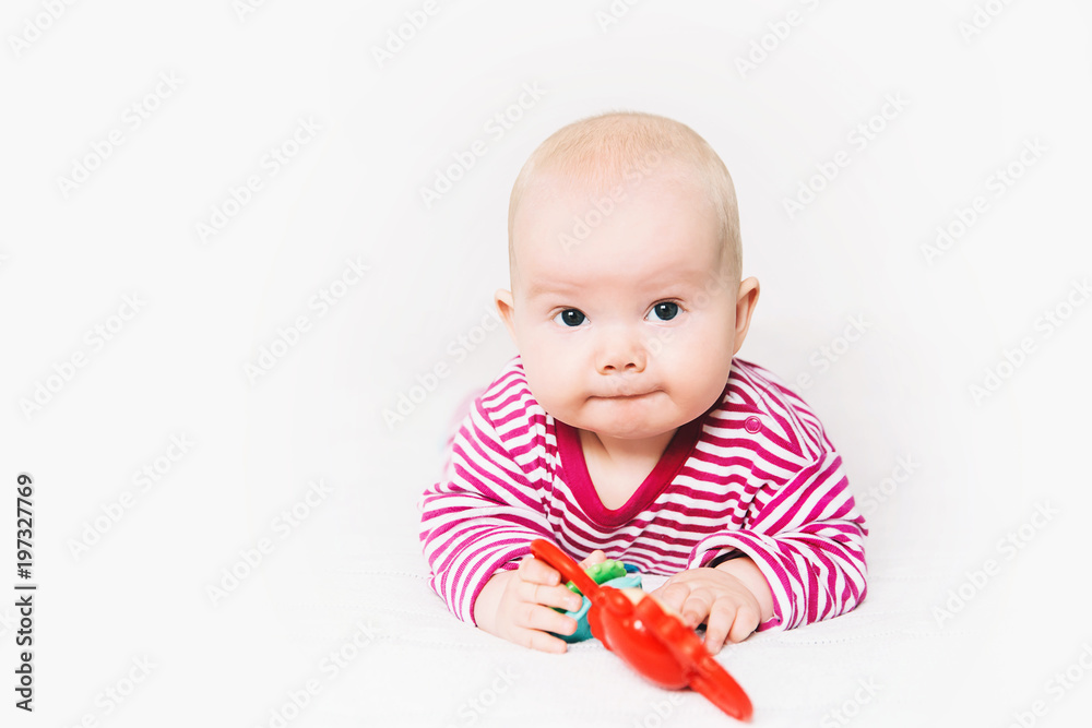 Smiling cutest baby playing with colorful toys Smiling cutest baby playing with colorful toys