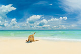 WOman alone on the beach in the Caribbean islands