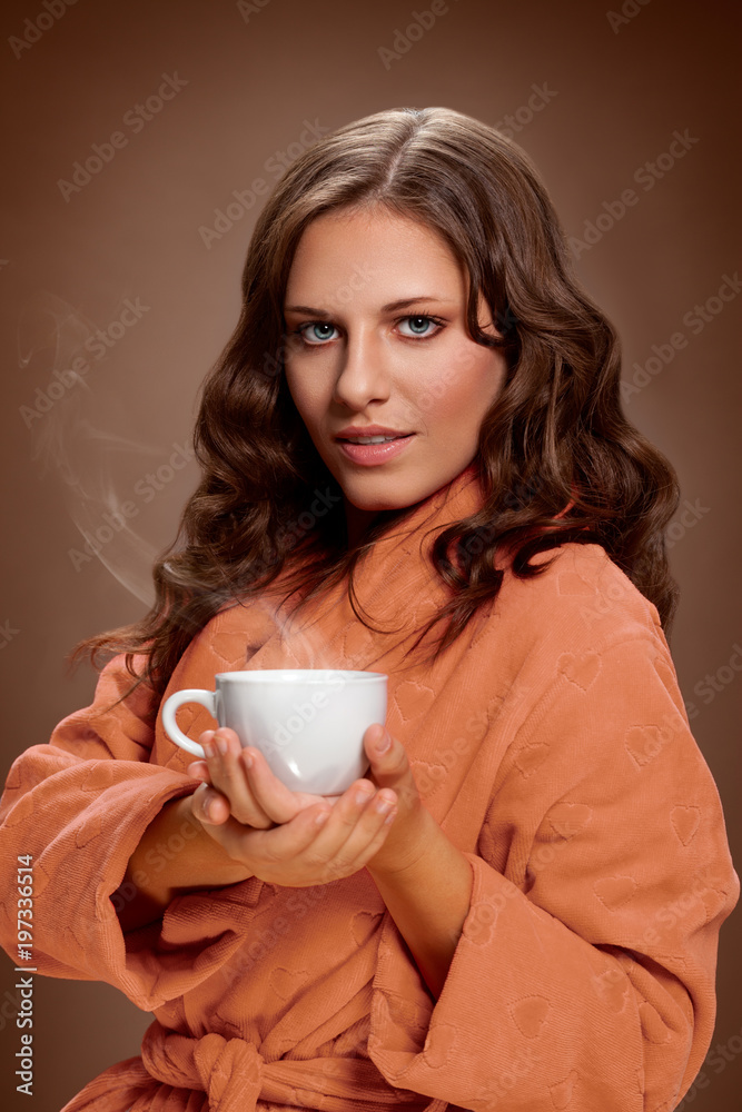 Cup with coffee in womans hand Cup with coffee in womans hand