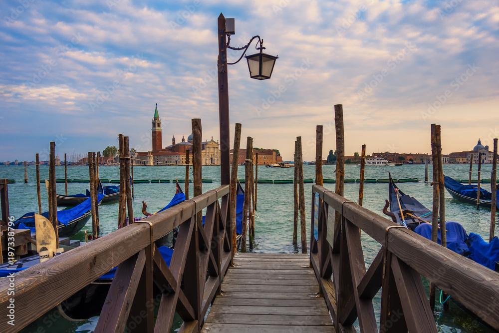 Pier and beautiful evening view on Island of Saint Giorgio Maggiore